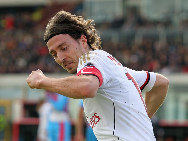 Riccardo Montolivo of Milan celebrates after scoring his team's equalizing goal during the Serie A match between Calcio Catania and AC Milan at Stadio Angelo Massimino on December 1, 2013