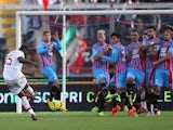 Mario Balotelli of Milan scores his team's second goal during the Serie A match between Calcio Catania and AC Milan at Stadio Angelo Massimino on December 1, 2013