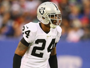 Charles Woodson of the Oakland Raiders in action against the New York Giants during their game at MetLife Stadium on November 10, 2013