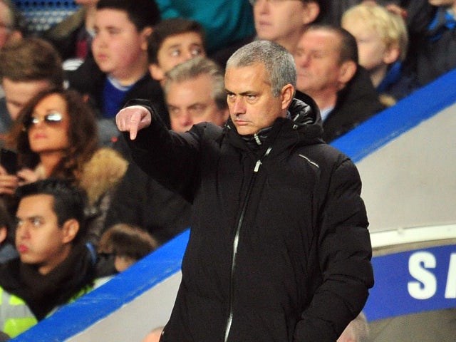 Chelsea's Portuguese manager Jose Mourinho gestures during the English Premier League football match between Chelsea and Southampton at Stamford Bridge in London on December 1, 2013