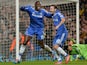 Chelsea's French-born Senegalese striker Demba Ba celebrates with Chelsea's Spanish midfielder Juan Mata after Ba scored Chelsea's third goal during the English Premier League football match between Chelsea and Southampton at Stamford Bridge in London, on