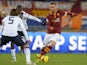 AS Roma's midfielder Daniele De Rossi vies with Cagliari's midfielder Daniele Conti and Cagliari's Colombian forward Victor Ibarbo during the Italian Serie A football match on November 25, 2013