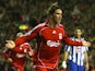 Fernando Torres of Liverpool celebrates scoring the opening goal during the UEFA Champions League Group A match between Liverpool and FC Porto at Anfield on November 28, 2007
