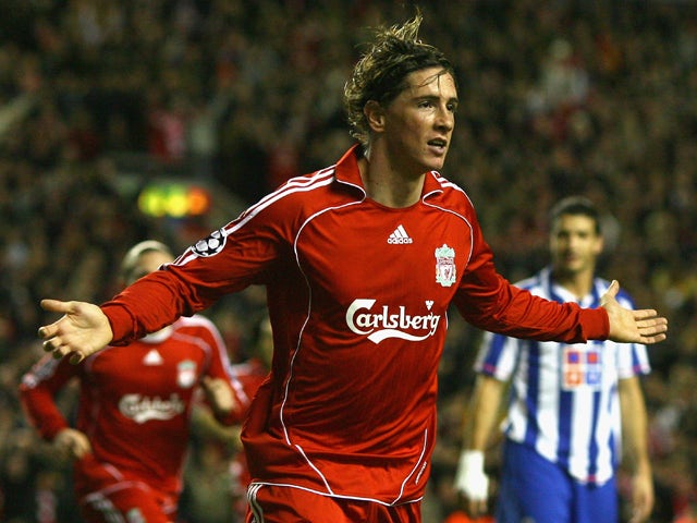 Fernando Torres of Liverpool celebrates scoring the opening goal during the UEFA Champions League Group A match between Liverpool and FC Porto at Anfield on November 28, 2007
