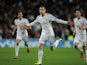 Real Madrid's Gareth Bale celebrates after scoring the opening goal against Galatasaray during their Champions League group match on November 27, 2013