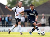 George Moncur of West Ham controls the ball from Elliot Buchanan of Boreham Wood during a Pre-Season Friendly match between Boreham Wood FC and West Ham United at Meadow Park on July 10, 2012