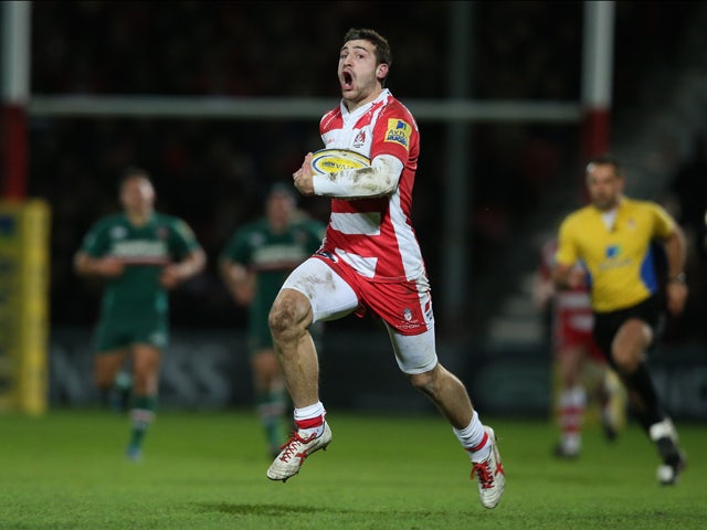 Jonny May of Gloucester breaks clear to score their second try during the Aviva Premiership match between Gloucester and Leicester Tigers at Kingsholm Stadium on November 29, 2013 