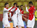 Monaco's James Rodriguez celebrates with Emmanuel Riviere and team mates after scoring a goal during a French L1 football match against Rennes on November 30, 2013