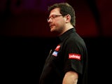James Wade of England looks dejected during his semi final match against Michael van Gerwen of the Netherlands on day fourteen of the 2013 Ladbrokes.com World Darts Championship at the Alexandra Palace on December 30, 2012