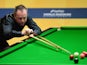 John Higgins of Scotland in action during his first round match against Mark Davis of England during the Betfair World Snooker Championship at the Crucible Theatre on April 22, 2013