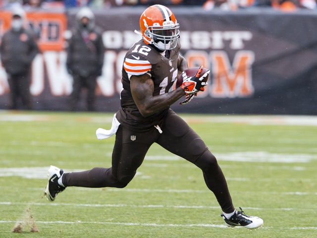 Wide receiver Josh Gordon #12 of the Cleveland Browns runs for a gain during the second half against the Pittsburgh Steelers at FirstEnergy Stadium on November 24, 2013