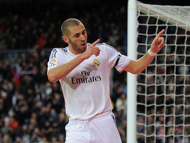 Karim Benzema of Real Madrid CF celebrates after scoring Real's 2nd goal during the La Liga match against Real Valladolid CF on November 30, 2013