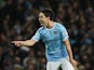 Samir Nasri of Manchester City celebrates his team's second goal during the Barclays Premier League match between Manchester City and Swansea City at Etihad Stadium on December 1, 2013