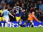 Samir Nasri of Manchester City scores his team's third goal during the Barclays Premier League match between Manchester City and Swansea City at Etihad Stadium on December 1, 2013