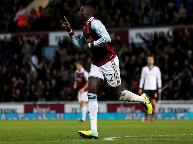 Mohamed Diame of West Ham United celebrates the first goal during the Barclays Premier League match between West Ham United and Fulham at Boleyn Ground on November 30, 2013