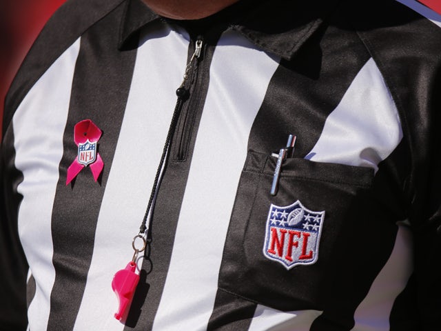 The NFL celebrates Breast Cancer Awareness month by the having referees wear pink apparel for the Kansas City Chiefs game against the Oakland Raiders October 13, 2013