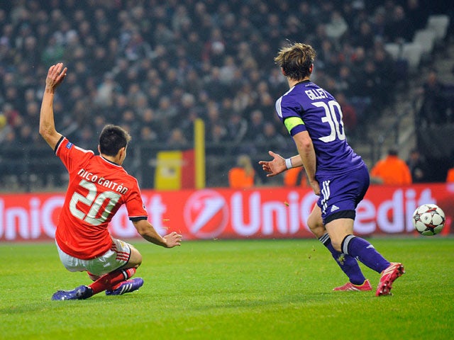Benfica's Nicolas Gaitan scores his team's second goal against Anderlecht during their Champions League group match on November 27, 2013