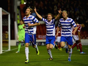 Kaspars Gorkss of Reading celebrates the second goal during the Sky Bet Championship match between Nottingham Forest and Reading at City Ground on November 29, 2013