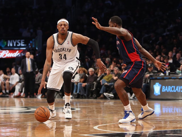 Paul Pierce #34 of the Brooklyn Nets dribbles the ball against the Detroit Pistons at the Barclays Center on November 24, 2013