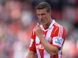 Robert Huth of Stoke City removes his mouthguard during the Barclays Premier League match between Stoke City and Crystal Palace at Britannia Stadium on August 24, 2013