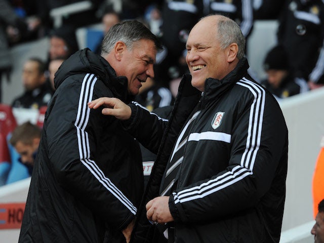 Manager Martin Jol of Fulham shares a joke with manager Sam Allardyce of West Ham United before the Barclays Premier League match on November 30, 2013