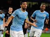Man City's Sergio Aguero scores the opening goal via the penalty spot against Viktoria Plzen during their Champions League group match on November 27, 2013