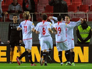 Sevilla top Group H with win