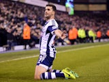 Shane Long of West Bromwich Albion celebrates as he scores their second goal during the Barclays Premier League match against Aston Villa on November 25, 2013