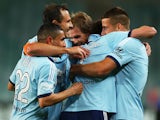 Ranko Despotovic of Sydney celebrates with team mates after scoring a goal during the round eight A-League match between Sydney FC and the Newcastle Jets at Allianz Stadium on November 30, 2013