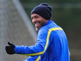 Former Arsenal player Thierry Henry warms up during a training session at London Colney on November 25, 2013