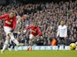 Manchester United's English striker Wayne Rooney scores his second goal from the penalty spot during the English Premier League football match between Tottenham Hotspur and Manchester United at White Hart Lane in London, on December 1, 2013