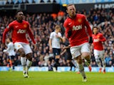 Wayne Rooney of Manchester United celebrates scoring their second goal from the penalty spot during the Barclays Premier League Match between Tottenham Hotspur and Manchester United at White Hart Lane on December 1, 2013