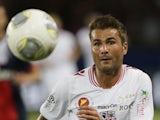 Ajaccio's Rumanian forward Adrian Mutu stares at the ball during the French L1 football match between Paris Saint-Germain (PSG) and Ajaccio (ACA) at the Parc des Princes stadium on August 18, 2013