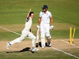 Mitchell Johnson of Australia celebrates after he took the wicket of Alastair Cook of England during day two of the Second Ashes Test Match between Australia and England at Adelaide Oval on December 6, 2013