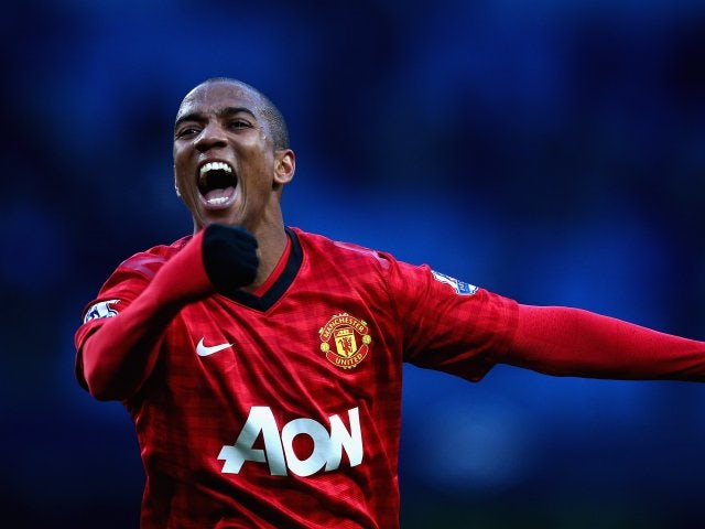 Ashley Young celebrates Manchester United's win over Manchester City on December 09, 2012.