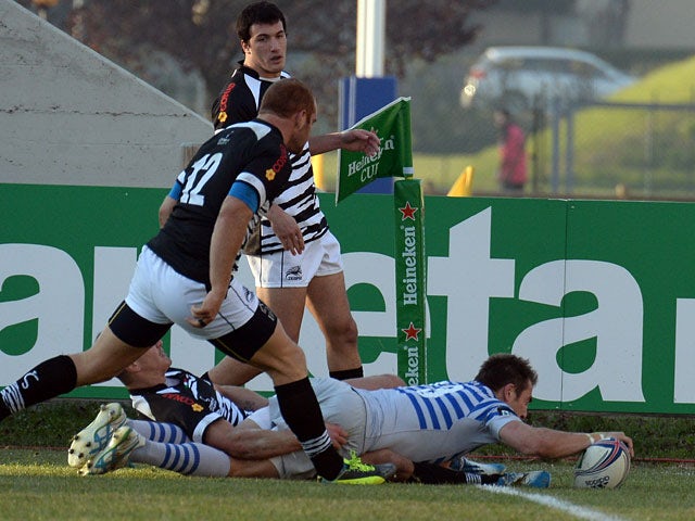 Saracens' Chris Wyles scores a try against Zebre during their Heineken Cup match on December 7, 2013