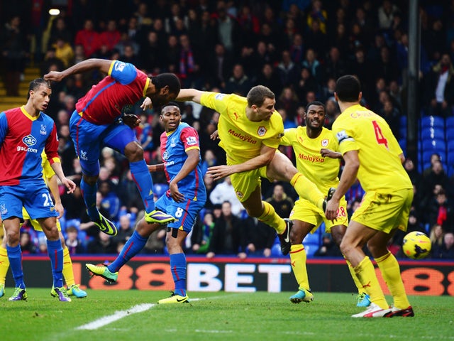 Cameron Jerome of Crystal Palace scores with his head during the Barclays Premier League match between Crystal Palace and Cardiff City at Selhurst Park on December 07, 2013