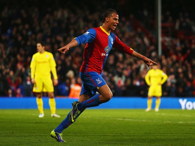 Marouane Chamakh of Crystal Palace celebrates after scoring during the Barclays Premier League match between Crystal Palace and Cardiff City at Selhurst Park on December 07, 2013