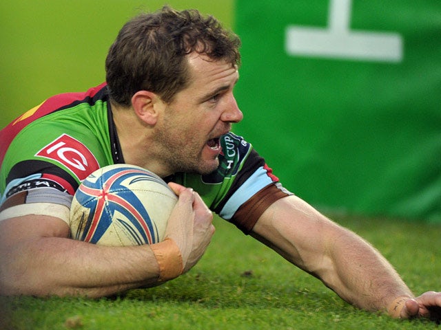 Harlequins' Danny Care scores a try against Racing Metro 92 during their Heineken Cup match on December 7, 2013