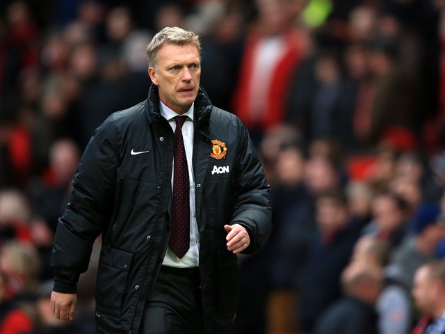 David Moyes the Manchester United manager walks off the pitch following his team's 1-0 defeat during the Barclays Premier League match between Manchester United and Newcastle United at Old Trafford on December 7, 2013 