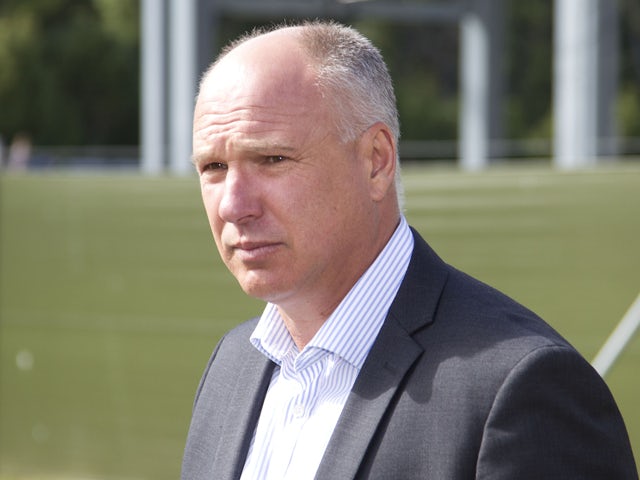 David White CEO of New Zealand Cricket arrives to speak to the media about the International Cricket Council (ICC) investigation into match fixing by past players at University Oval in Dunedin, New Zealand, on December 5, 2013