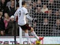 Fulham's Dimitar Berbatov scores his team's second goal via the penalty spot against Aston Villa during their Premier League match on December 8, 2013