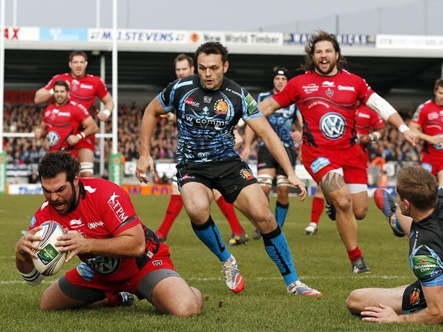Toulon's Florian Fresia scores a try against Exeter Chiefs during their Heineken Cup match on December 7, 2013