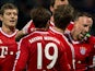 Bayern's Franck Ribery celebrates with teammates after scoring his team's third goal against Werder Bremen on December 7, 2013