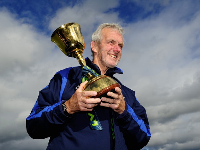 Durham coach Geoff Cook holds the trophy after winning the LV County Championship Division One title after day three of the LV County Championship Division One match between Durham and Nottinghamshire at The Riverside on September 19, 2013