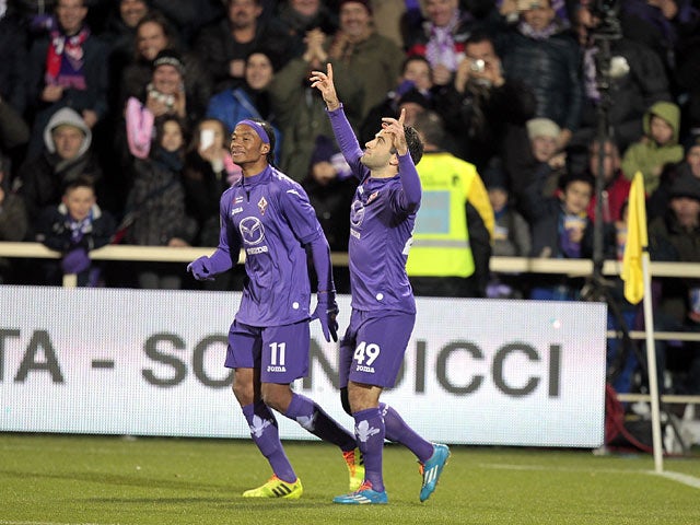 Fiorentina's Giuseppe Rossi celebrates after scoring his team's third goal against Hellas Verona during their Serie A match on December 2, 2013