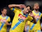 Napoli's Goran Pandev celebrates after scoring his team's second goal against Lazio during their Serie A match on December 2, 2013