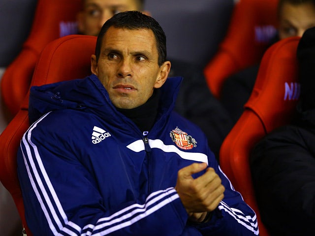 Sunderland manager Gus Poyet in the dugout during the match against Chelsea on December 4, 2013