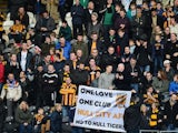 Hull City fans display a banner prior to the Barclays Premier League match between Hull City and Liverpool at KC Stadium on December 1, 2013