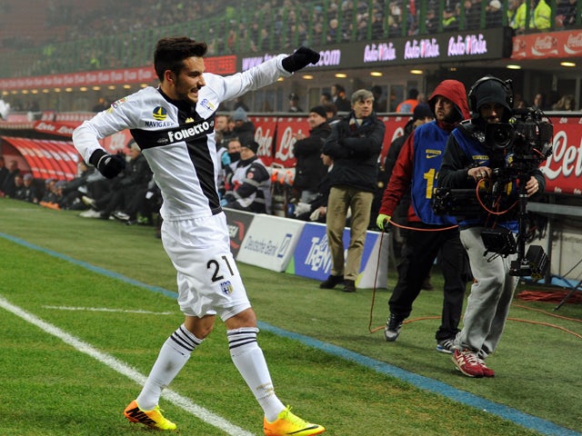 Nicola Sansone of Parma FC celebrates scoring the first goal during the Serie A match between FC Internazionale Milano and Parma FC at Stadio Giuseppe Meazza on December 8, 2013